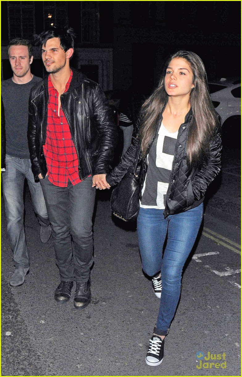 taylor lautner marie avgeropoulos matching jackets london 03